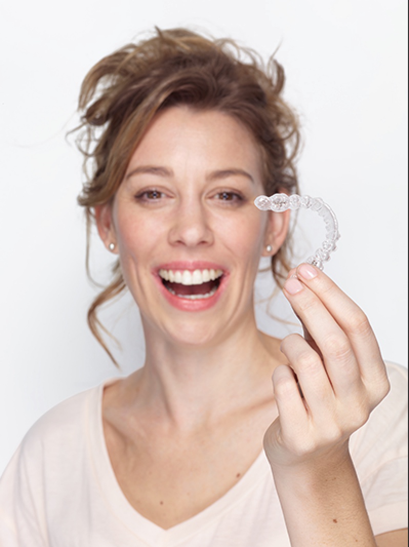 How Invisalign clear aligners straighten teeth for adults in Boca Raton and Delray Beach