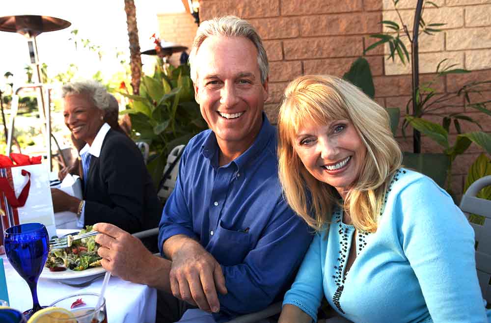 Happy All-on-4 full mouth dental implant patients of Ressler Dental in Delray Beach